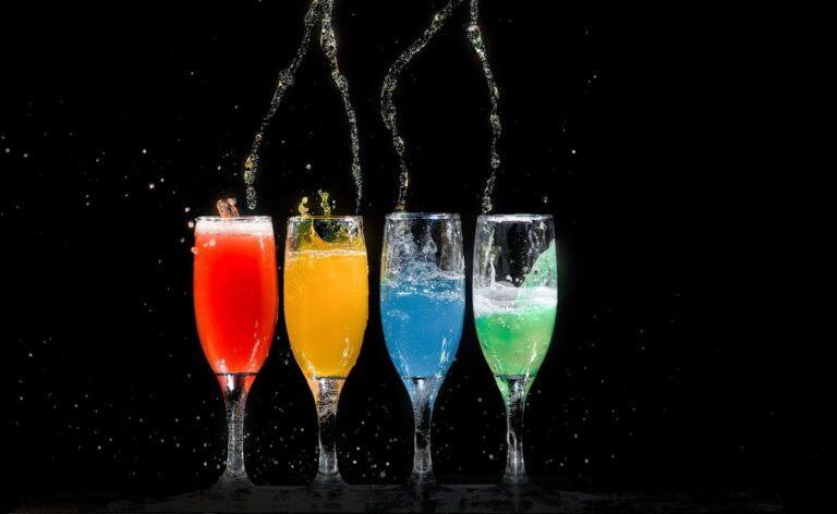 colored juices in champaign glasses